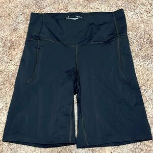Black Under Armor biker shorts.